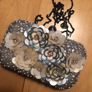 Live, love, loft Hard case bag with crossbody chain.